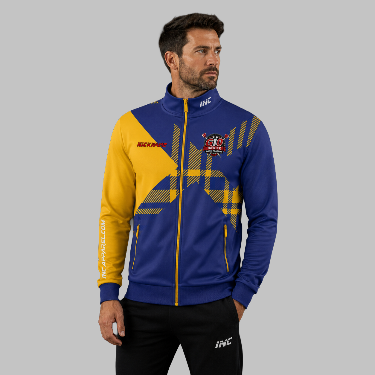 Front view of the unisex Official Hawick Darts Academy Tournament Jacket, highlighting the sleek full-zip design, athletic collar, and prominent official academy crest.