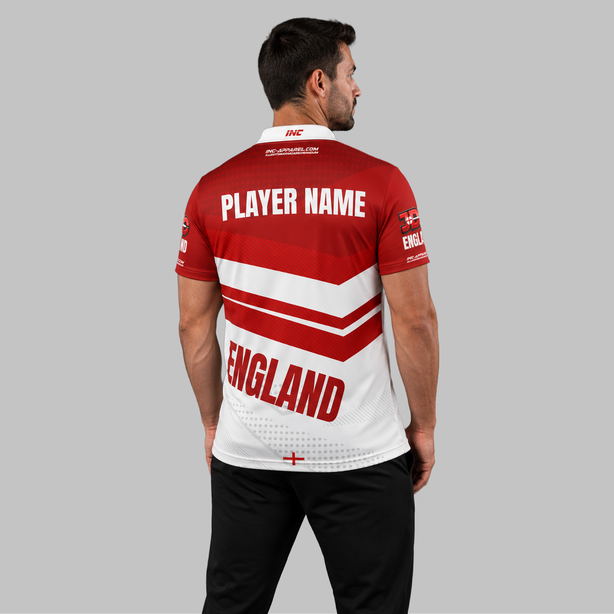Back view of the Men and Youth Official JDC England Zip Polo Darts Shirt, showing the clean flow of the sublimated national team graphics across the shoulders.