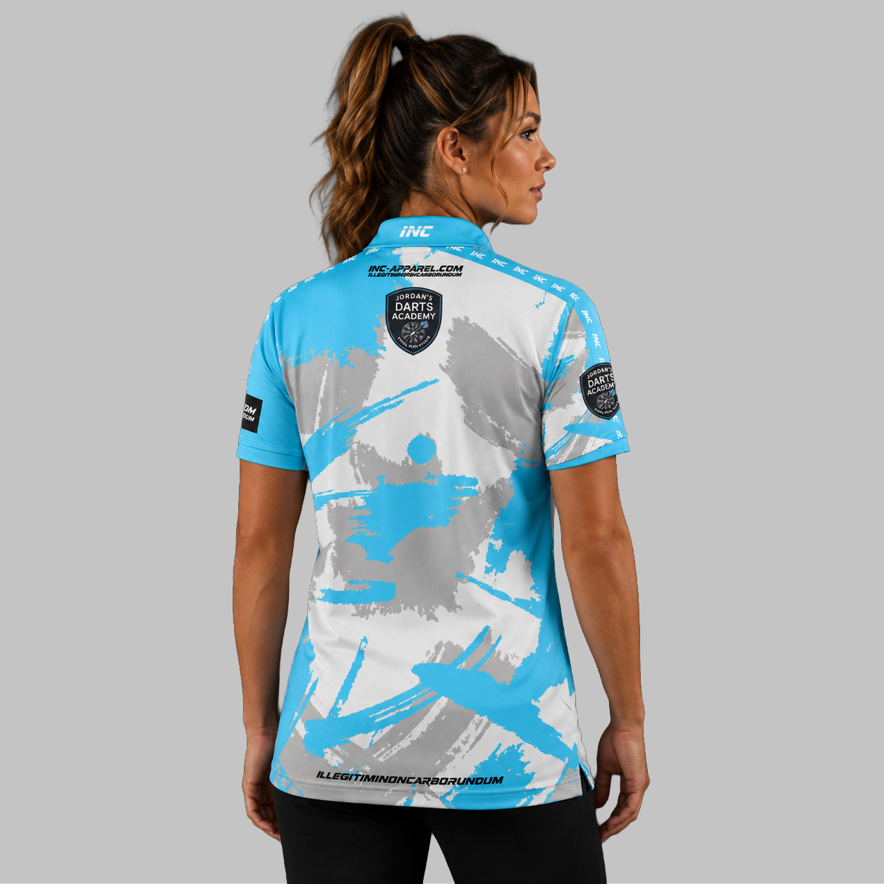 Back view of the Women's Official Jordan's Darts Academy Shirt, showcasing the seamless flow of the sublimated academy design across the shoulders.