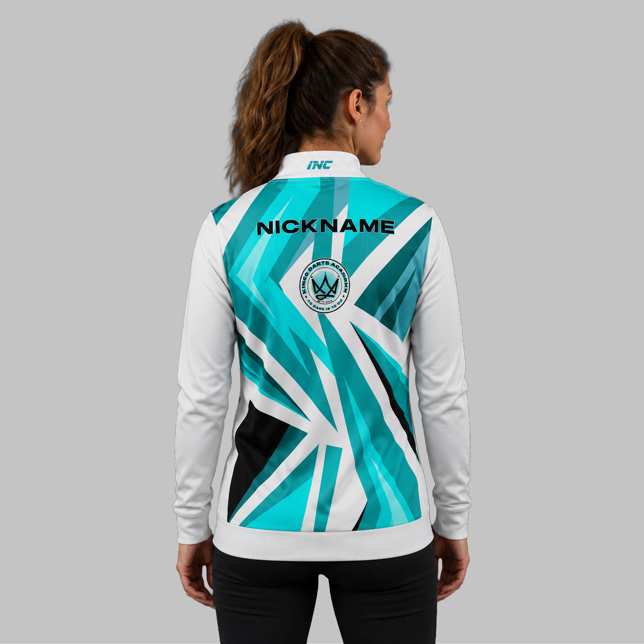 Back view of the unisex Official Kings Darts Academy Quarter Zip Midlayer, showcasing the clean athletic silhouette and flexible shoulder construction.