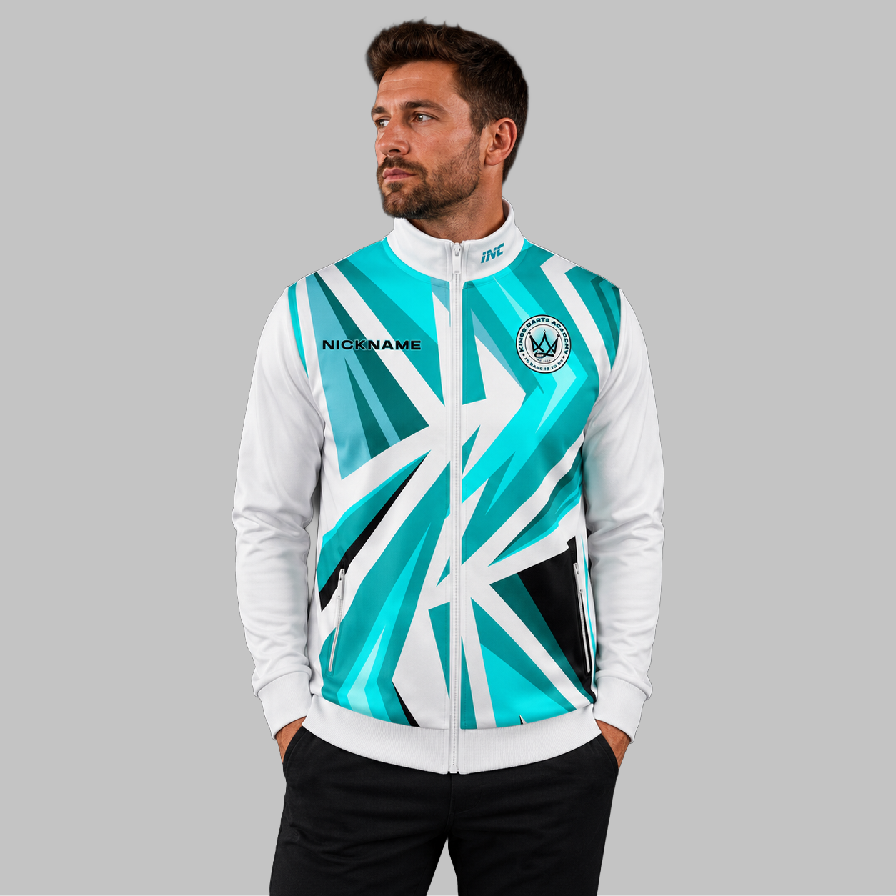 Front view of the unisex Official Kings Darts Academy Tournament Jacket, highlighting the sleek full-zip design, athletic collar, and prominent official academy crest.