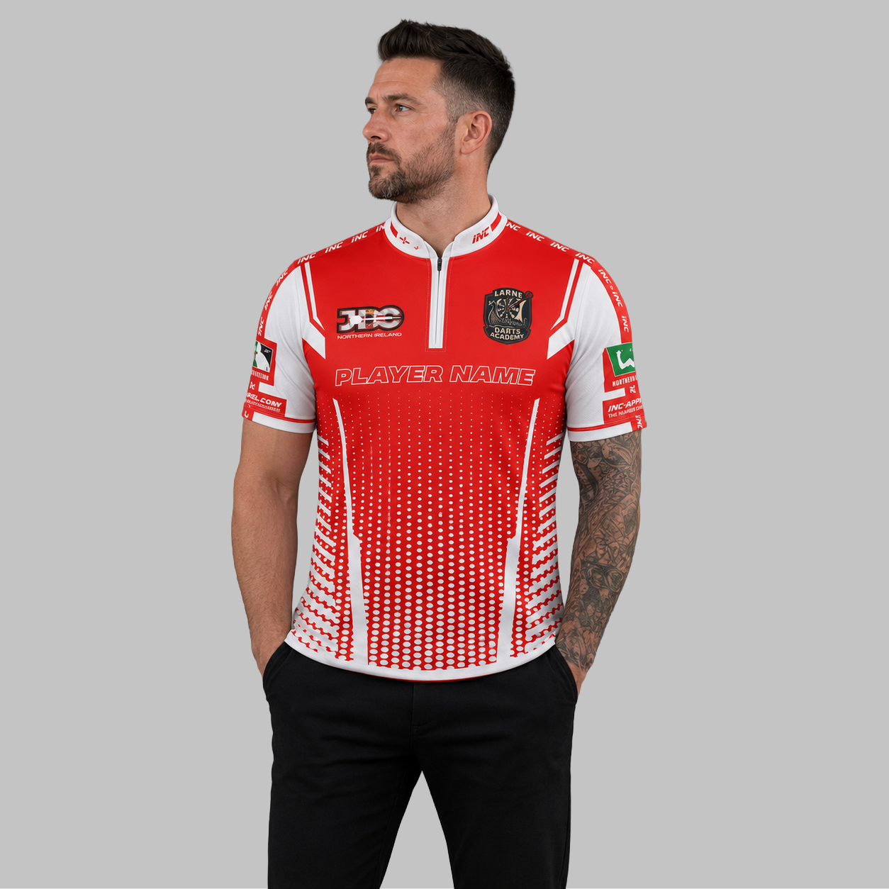 Front view of the Men and Youth Official Larne Darts Academy Shirt, showing the vibrant academy colors, professional athletic collar, and official crest.