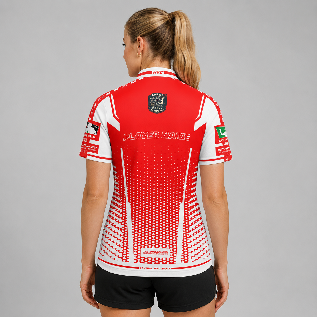Back view of the Women's Official Larne Darts Academy Shirt, showcasing the seamless flow of the sublimated academy design across the shoulders.