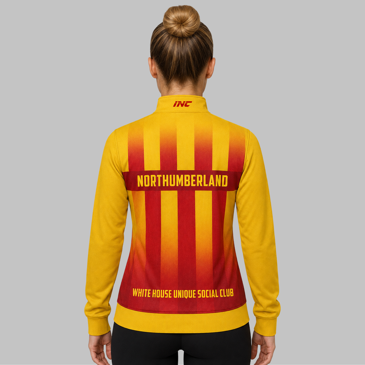 Back view of the unisex Official Northumberland County Darts Quarter Zip Midlayer, showcasing the clean professional fit and flexible shoulder paneling.