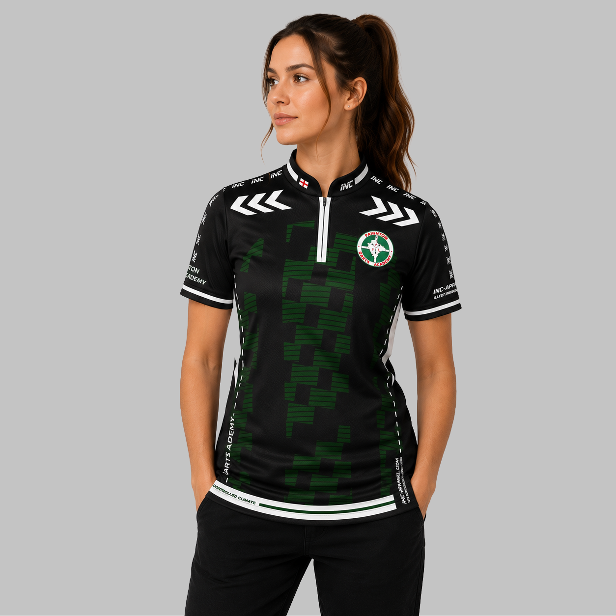 Front view of the Women's Official Paignton Darts Academy Mentors Darts Shirt, highlighting the custom-contoured athletic fit, professional collar, and official academy crest.