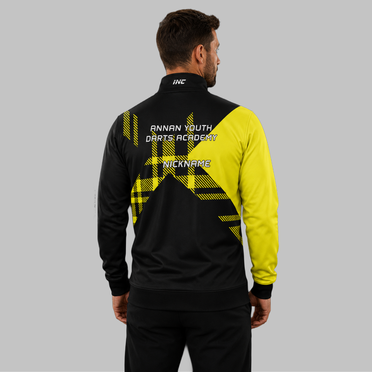 Back view of the unisex Official Prime Sports Darts Academy Tournament Jacket, showing the clean athletic panels and comfortable outer-shell design across the shoulders.