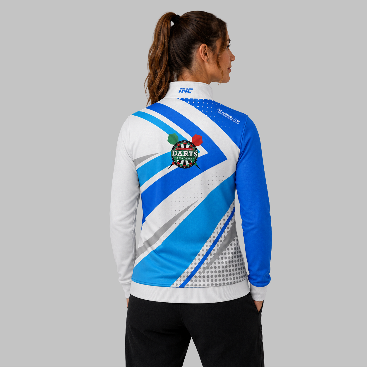 Back view of the unisex Official West Belfast Junior Academy 1/4 Zip Midlayer in Blue, showcasing the clean athletic silhouette and flexible shoulder construction.