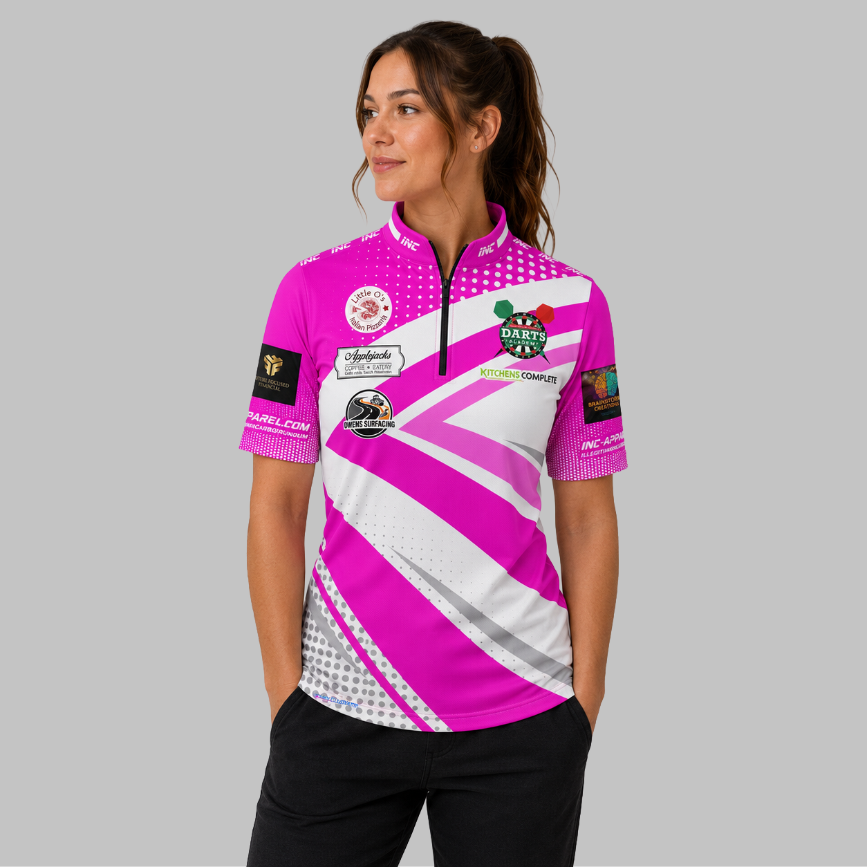 Front view of the Official West Belfast Junior Academy Darts Shirt in Pink, showing the vibrant team colors, professional collar, and sharp sublimated academy crest.