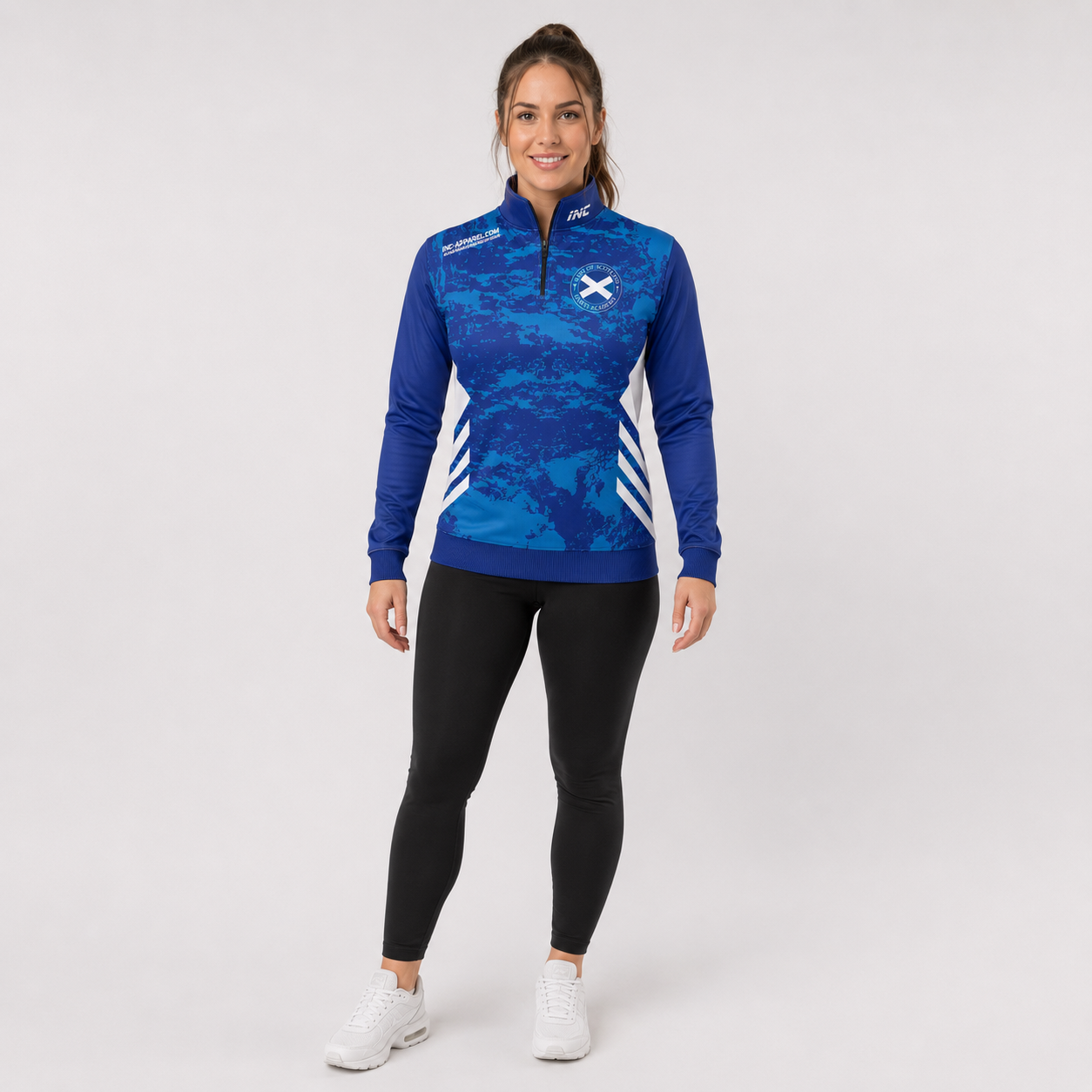 Front view of the unisex Official West of Scotland Darts Academy Quarter Zip Midlayer, highlighting the athletic team styling, stand-up collar, and official academy crest.