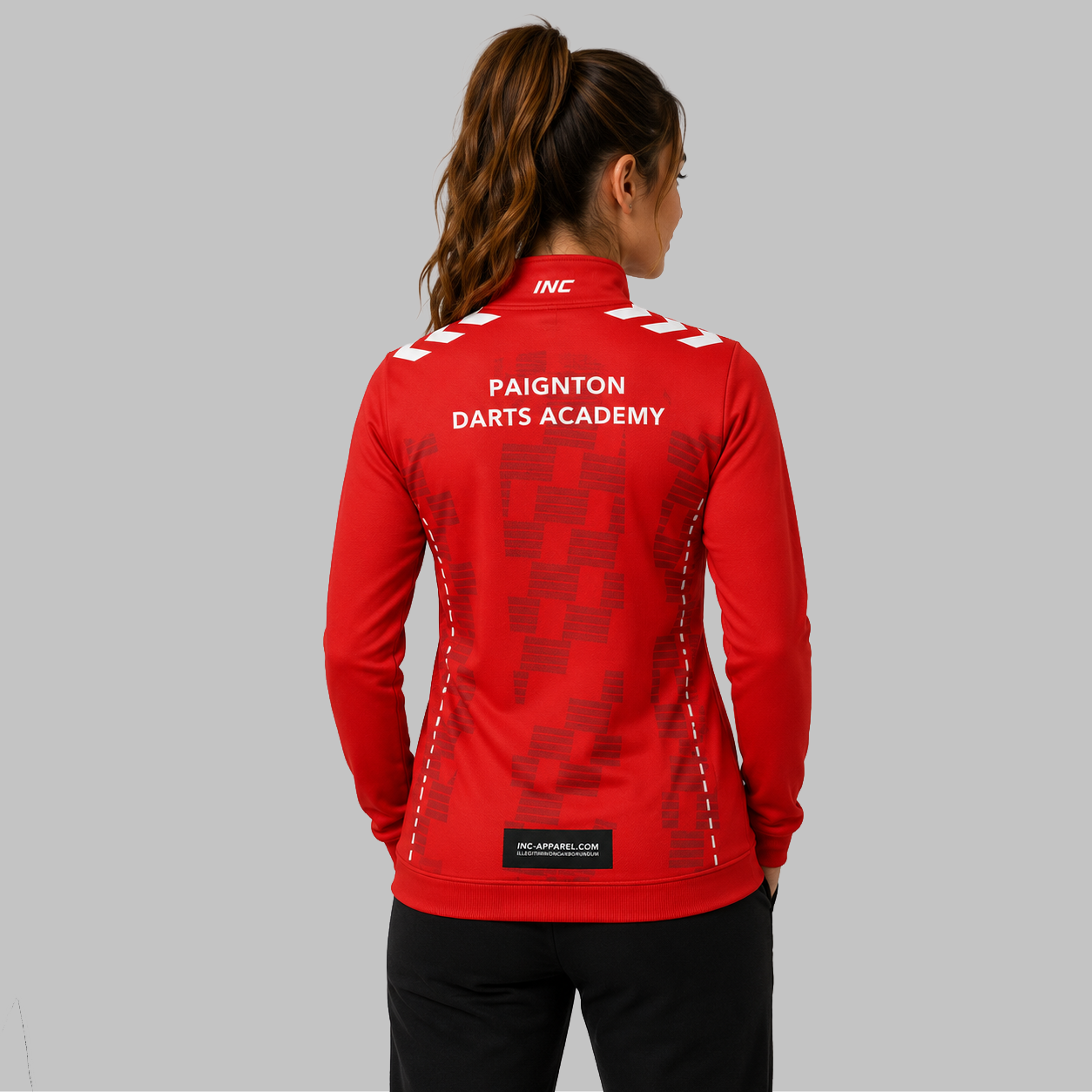 Back view of the unisex Paignton Darts Academy Quarter Zip Midlayer, showcasing the clean athletic silhouette and flexible shoulder construction.