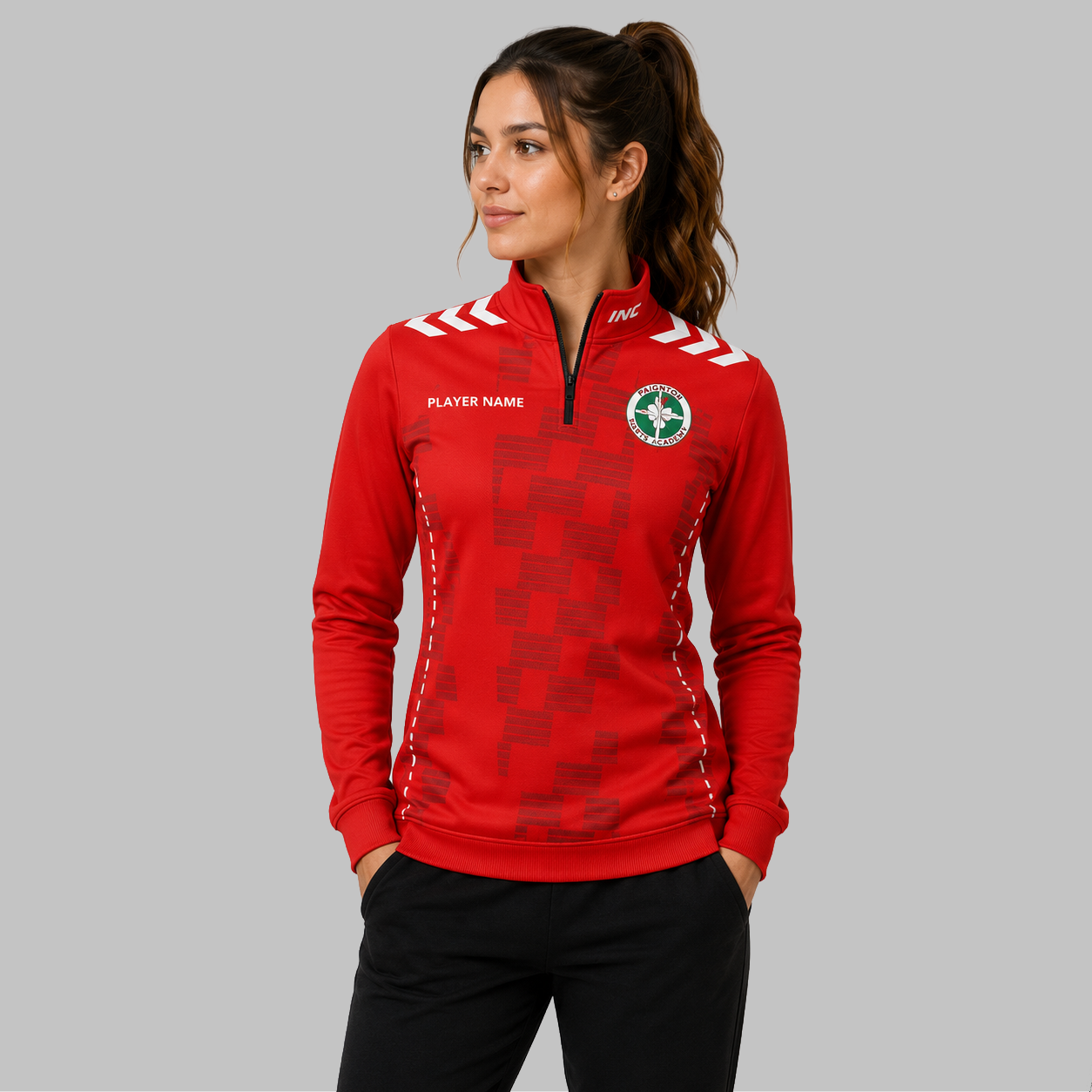 Front view of the unisex Paignton Darts Academy Quarter Zip Midlayer, highlighting the athletic team styling, stand-up collar, and official academy crest.