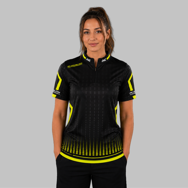 Front view of the Women's Praecisio black and lime green darts and pool shirt, showcasing the custom-tailored athletic jersey layout with its sharp, high-contrast geometric design.