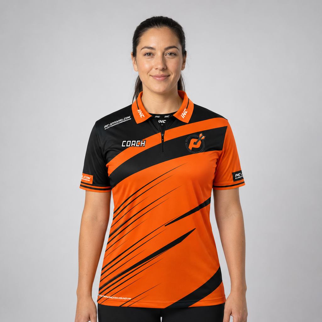 Front view of the Women's Official Coaches Prime Sports Darts Academy shirt, showing the custom-contoured athletic fit and distinctive coach branding.