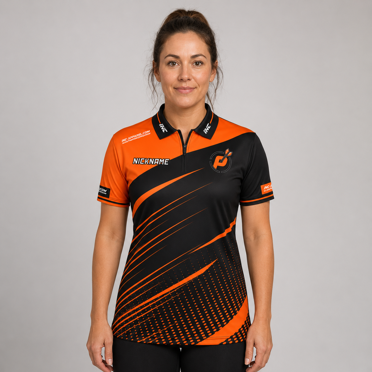 Front view of the Women's Official Prime Sports Darts Academy shirt, showing the custom-contoured athletic fit and prominent academy branding.