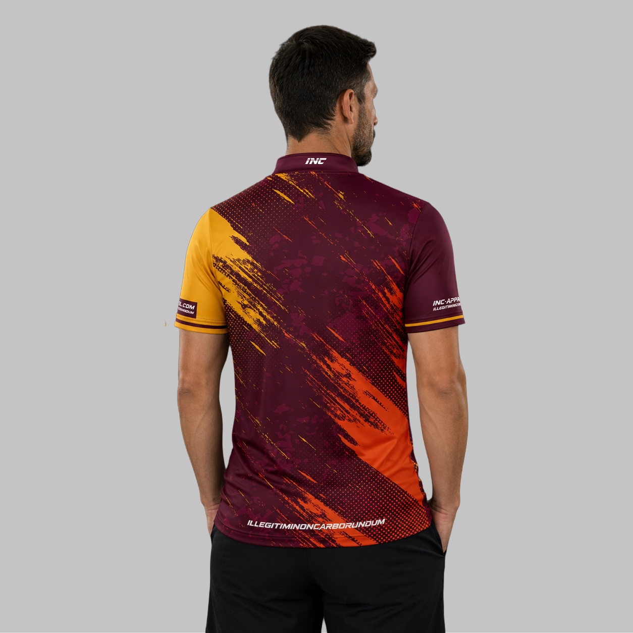 Back view of the Men and Youth Regina burgundy darts shirt, showing the clean, continuous flow of the deep burgundy graphic design across the shoulders.