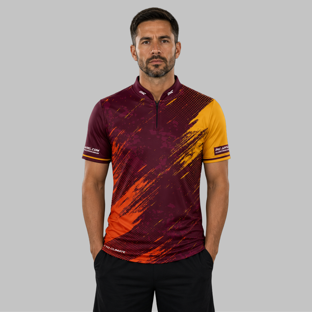 Front view of the Men and Youth Regina burgundy darts shirt, showcasing the dynamic athletic jersey design with its sharp, vibrant geometric layout.