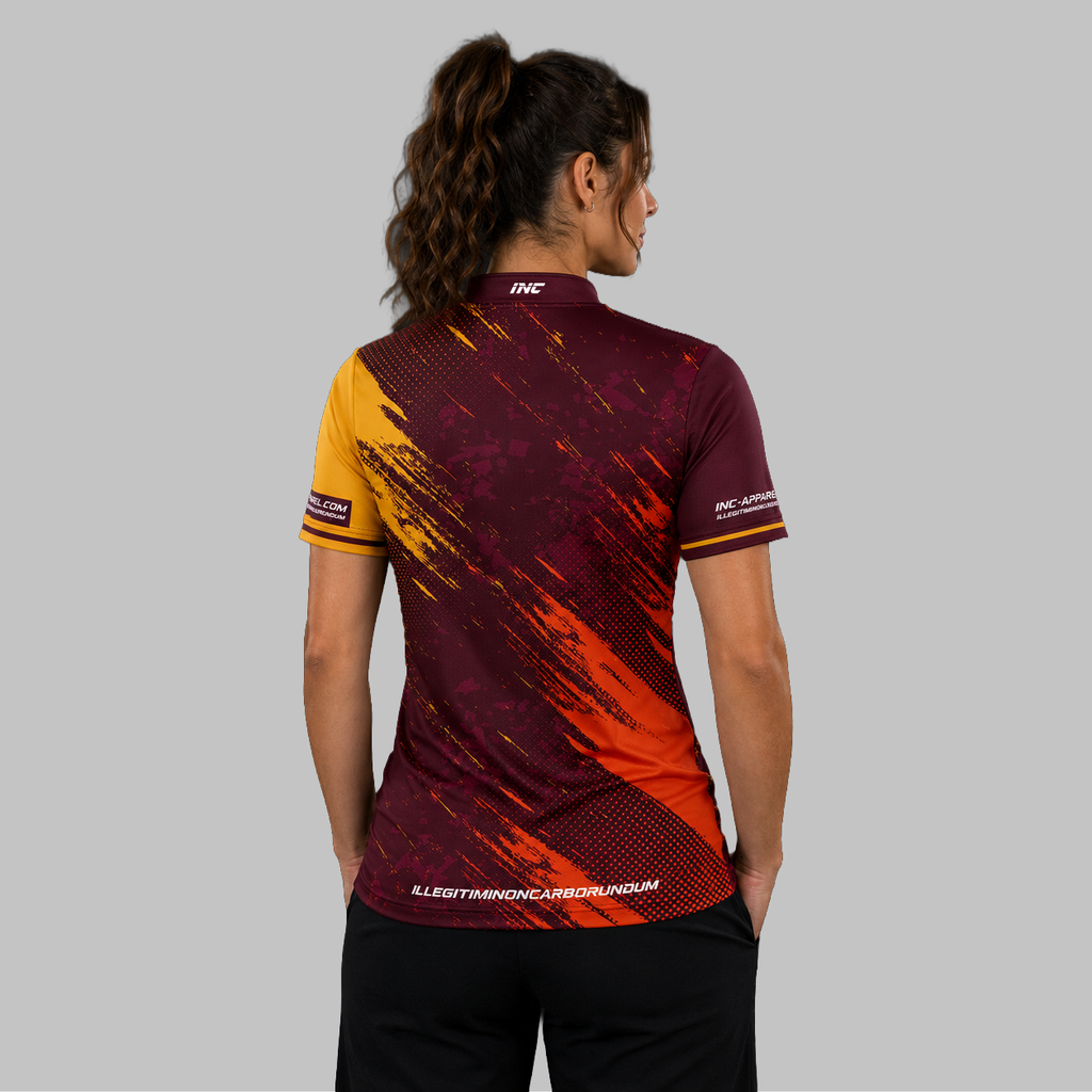 Back view of the Women's Regina burgundy darts shirt, showcasing the seamless flow of the deep burgundy graphic pattern across the shoulders.