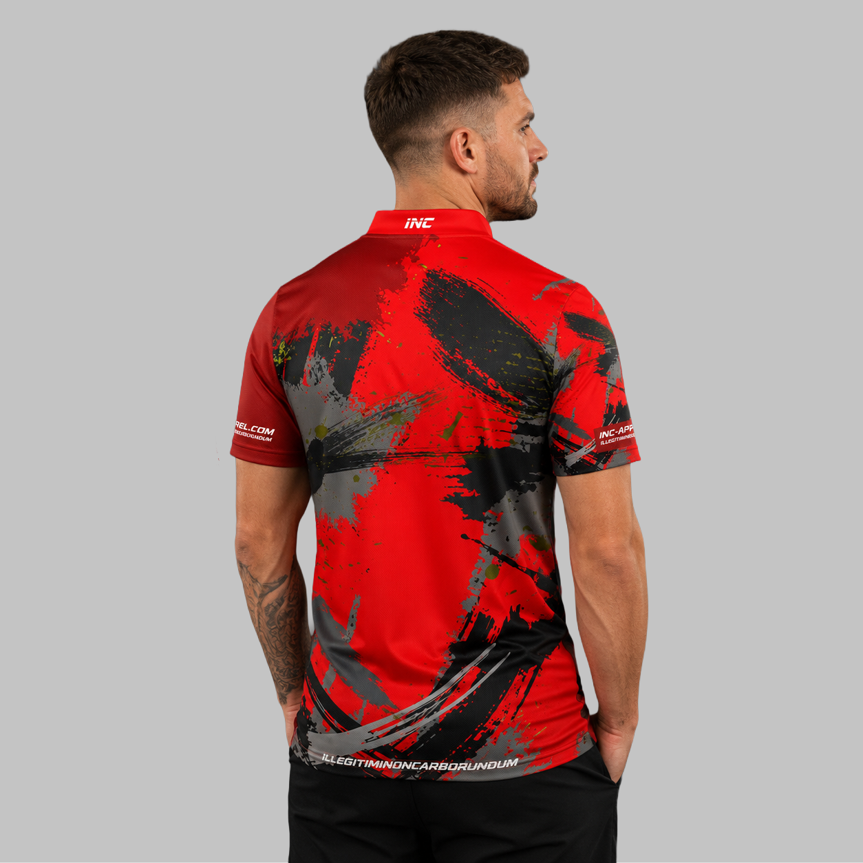 Back view of the Men's Rogatus Sanguis darts and pool shirt, showing the clean and continuous flow of the bold graphic design across the shoulders.
