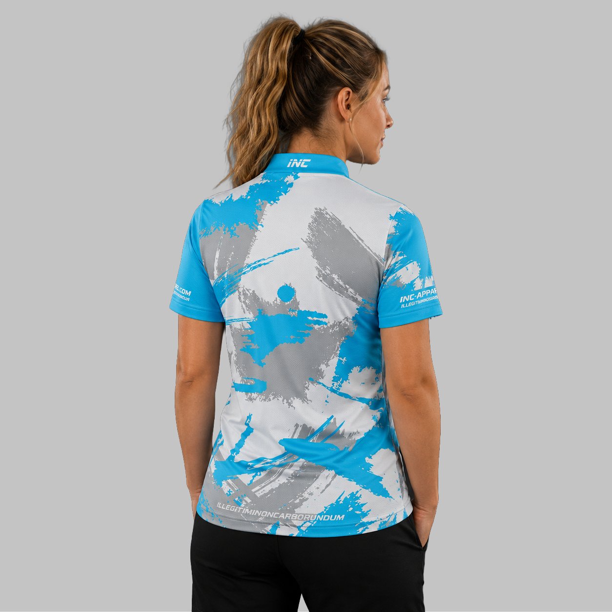 Back view of the Women's Rogatus Vitriarius darts and pool shirt, highlighting the seamless and clean continuation of the vibrant, geometric layout across the shoulders.