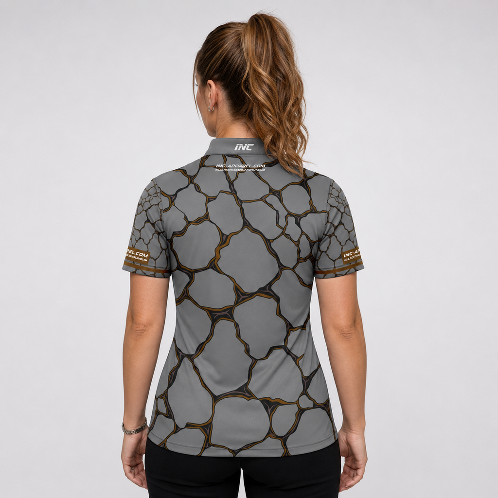 Back view of the Womens Saxosus brown darts shirt, showing the clean continuation of the bold graphic athletic pattern across the back.