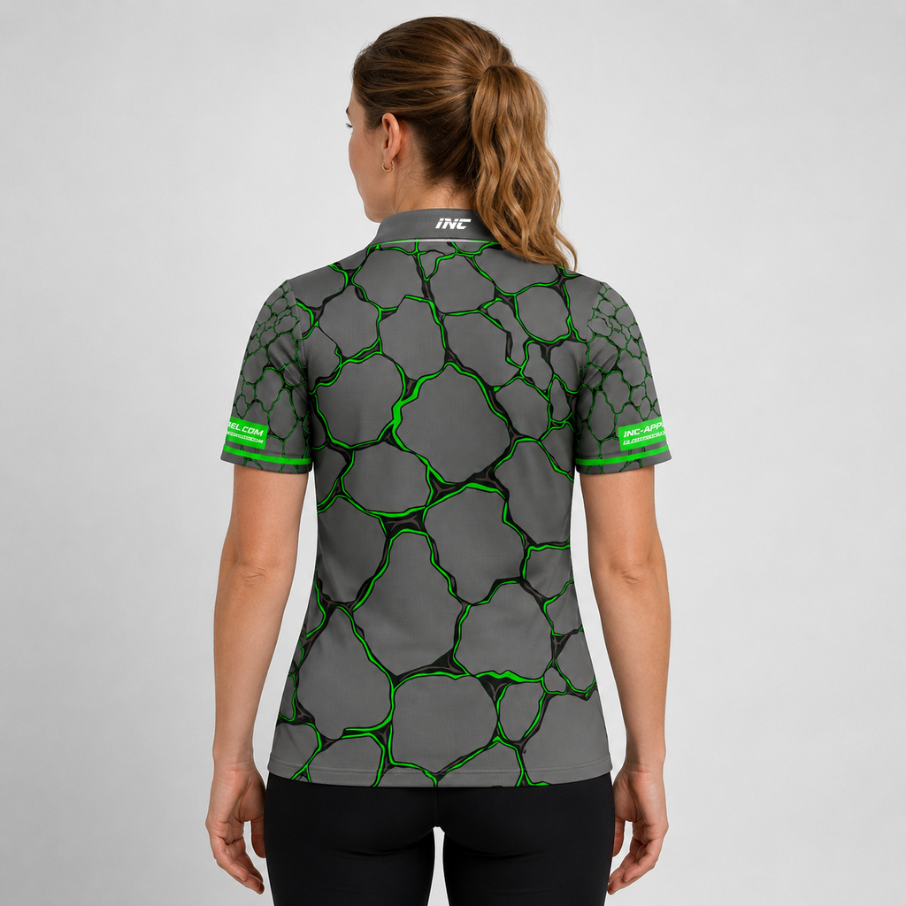 Back view of the Womens Saxosus green darts shirt, showing the clean continuation of the bold graphic athletic pattern across the back.