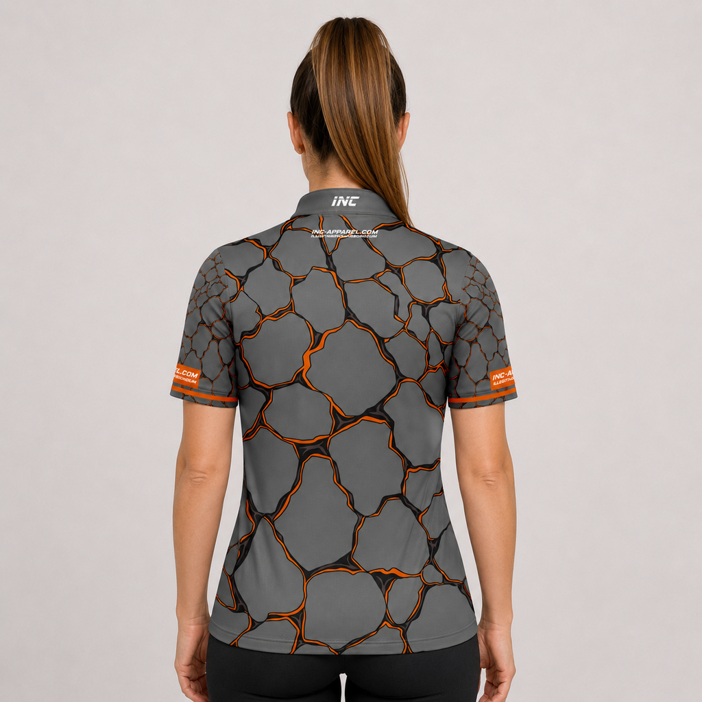 Back view of the Womens Saxosus orange darts shirt, showing the clean continuation of the bold graphic athletic pattern across the back.