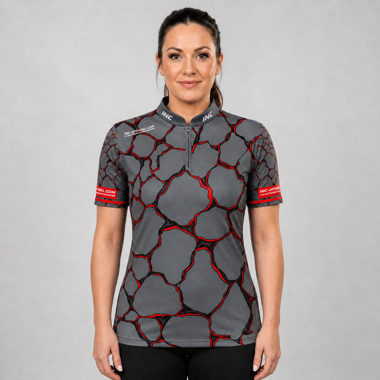 Front view of the Womens Saxosus red darts shirt, featuring a custom tailored athletic jersey design in vibrant shades of red.