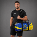 Side profile of the Official South Lincs Darts Academy kit bag, showcasing the spacious 55x33x33cm dimensions and clear team branding.