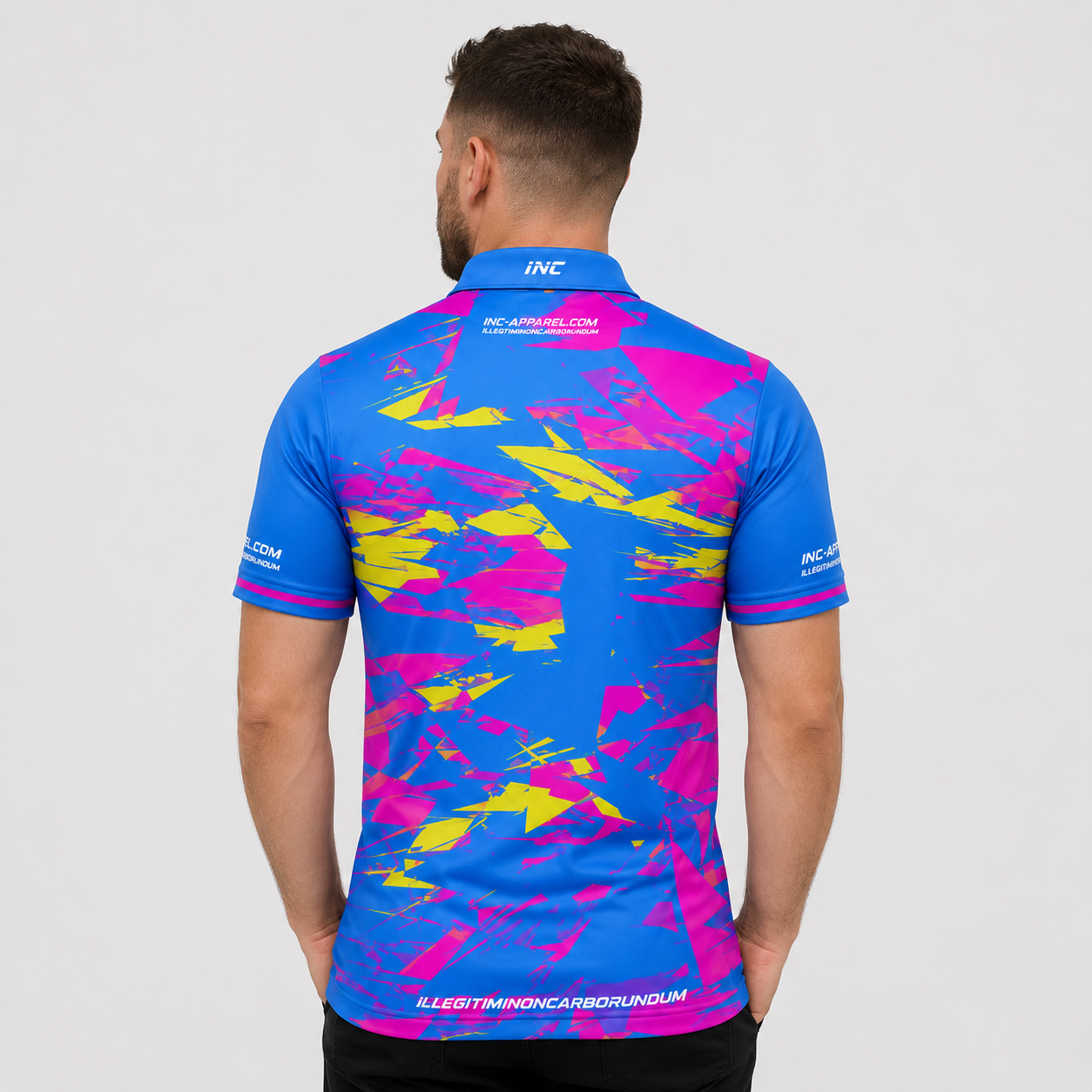 Back view of the INC-APPAREL Vesanus Darts and Pool Academy Shirt showing the continuous blue, pink, and yellow sublimated design.