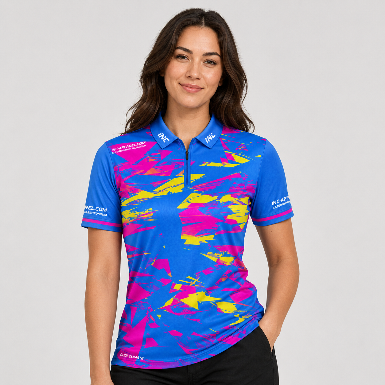 Front view of the INC-APPAREL Womens Vesanus darts and pool shirt featuring a vibrant blue and pink geometric design.