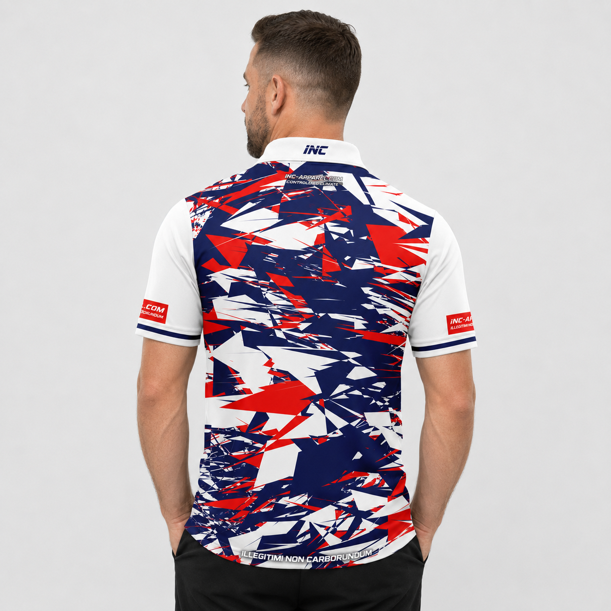 Back view of the INC-APPAREL Vesanus darts and pool shirt, showing the continuous sublimated red, white, and blue design.