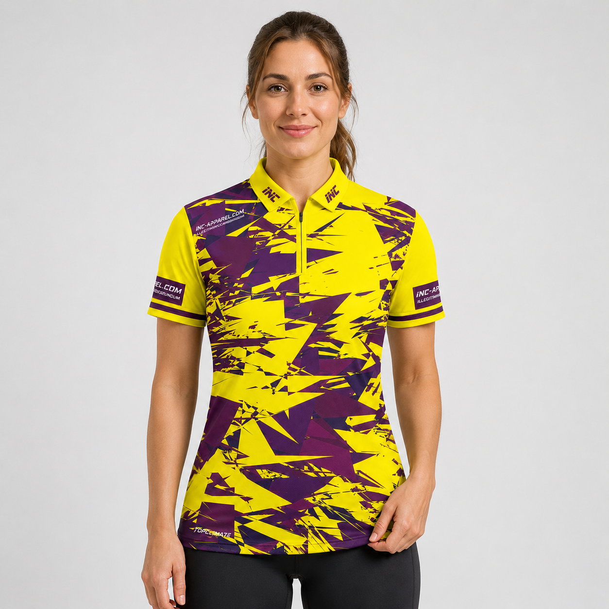 Front view of the INC-APPAREL Womens Vesanus Darts and Pool Academy Shirt featuring a vibrant yellow and abstract geometric pattern.