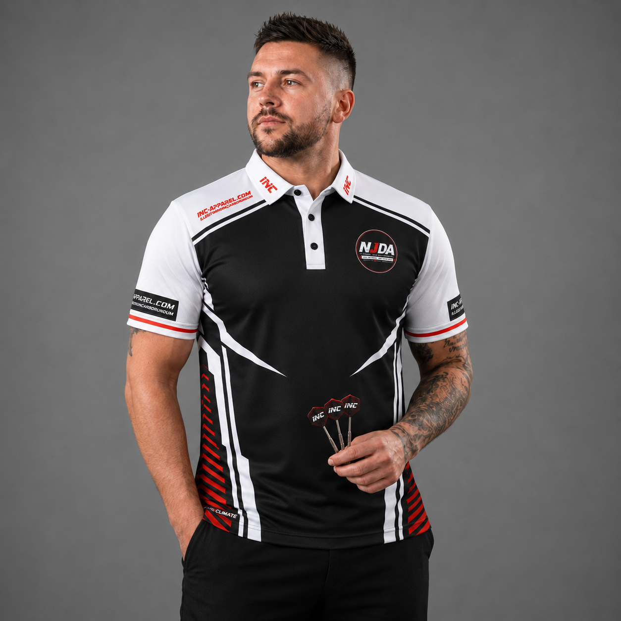Official National Junior Darts Association darts teamwear shirt front featuring the NJDA logo, shown in men's and youth sizes.