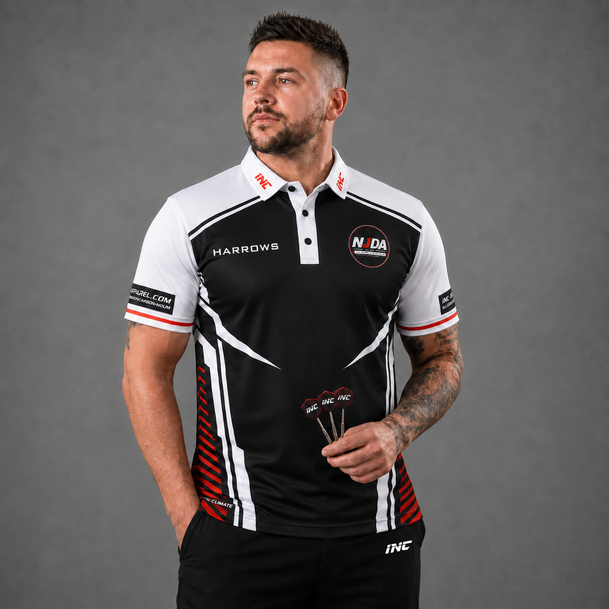 Official National Junior Darts Association darts teamwear shirt front featuring the NJDA logo, shown in men's and youth sizes.