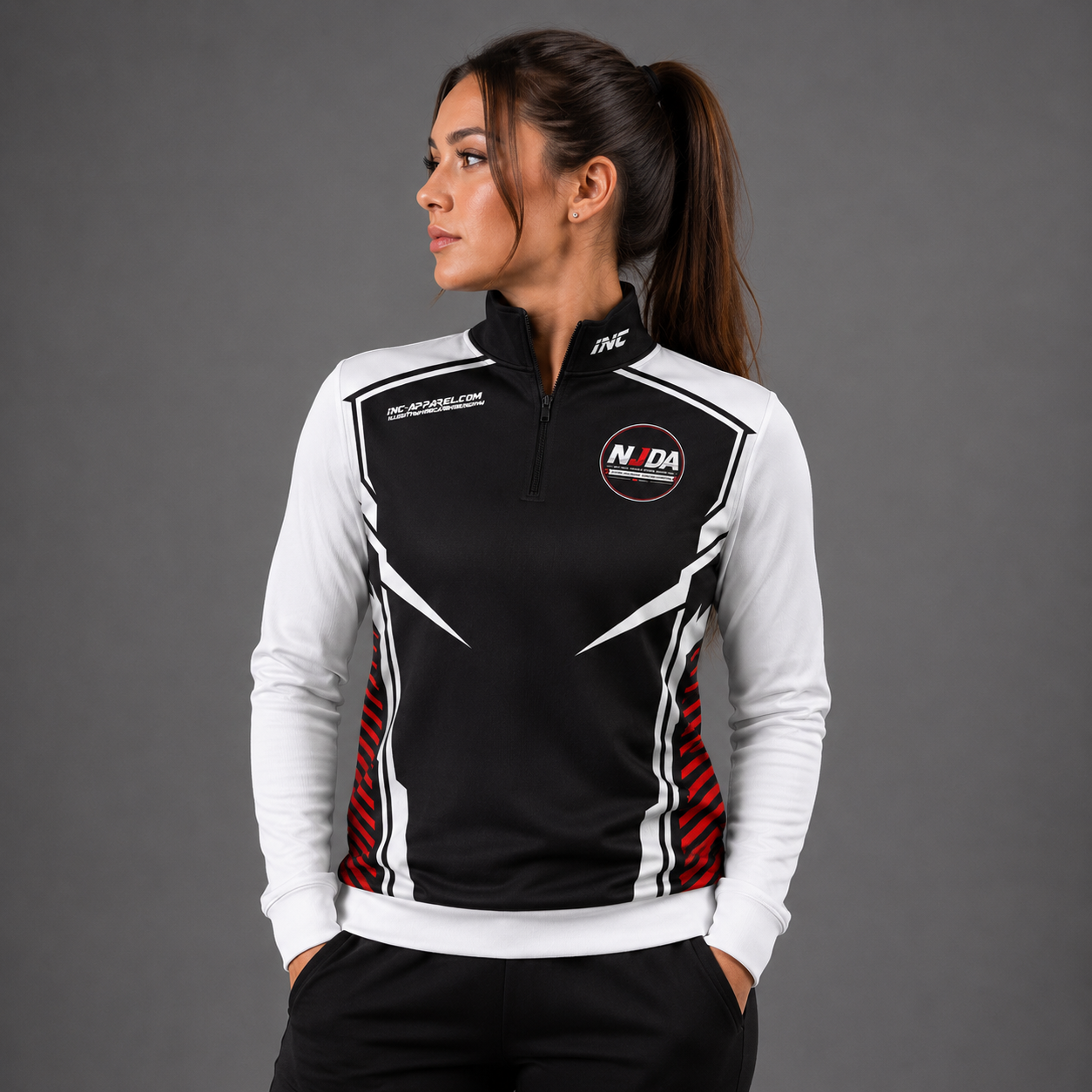 Official National Junior Darts Association unisex quarter zip front midlayer pullover in black, featuring the NJDA logo on the chest and a performance stand-up collar.